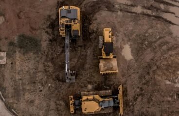 construction and engineering sector – aerial shot of construction equipment